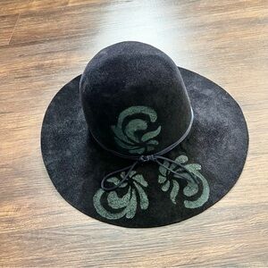 Elegant Black Hat with Artistic Green Pattern